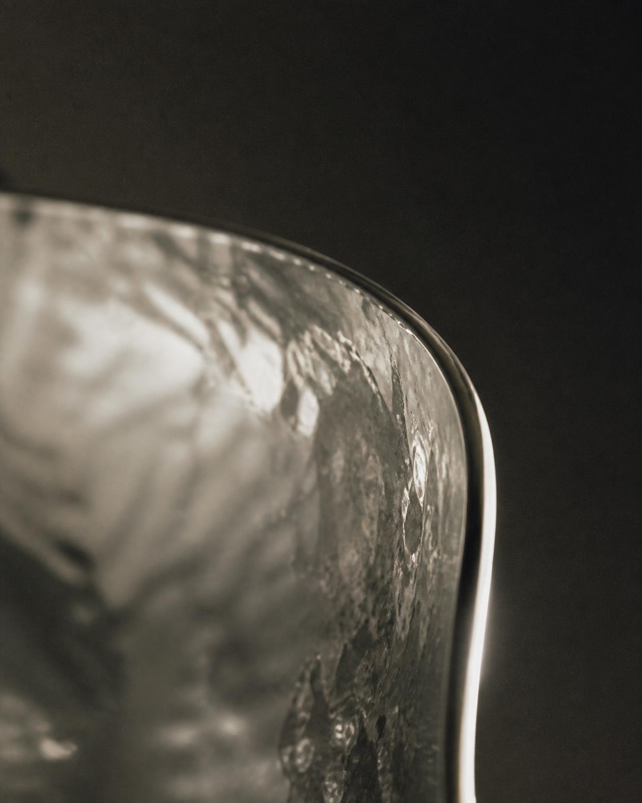 Macro de una superficie de plata pulida